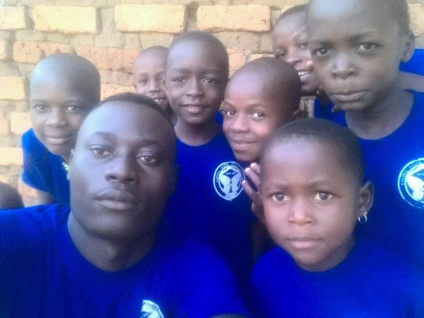 Living Hope Foundation Director Mukwana Abdallah Jr. with the children