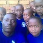 Living Hope Foundation Director Mukwana Abdallah Jr. with the children