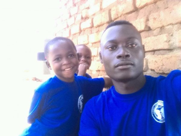 Living Hope Foundation Director Mukwana Abdallah Jr. with the children