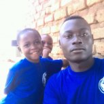 Living Hope Foundation Director Mukwana Abdallah Jr. with the children