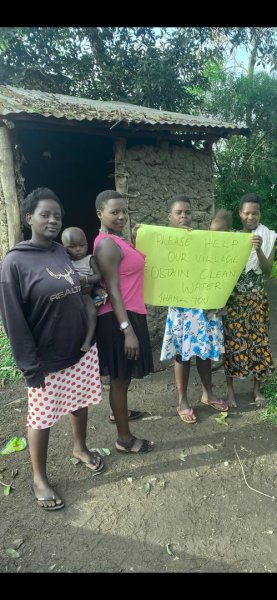 Twongirwe Ali - Yesiga Ambroze - ilva Mbeeta Clean Water Village Campaign 
