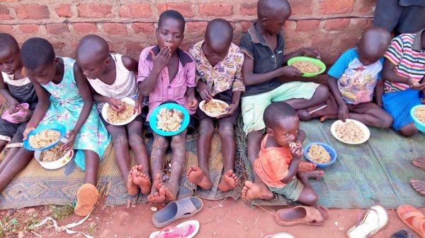 Mrs. Kawudha a widow and fine member of our staff has served a meal