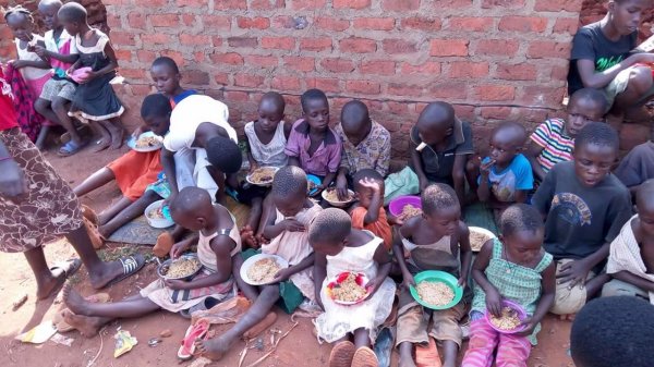 Mrs. Kawudha a widow and fine member of our staff has served a meal
