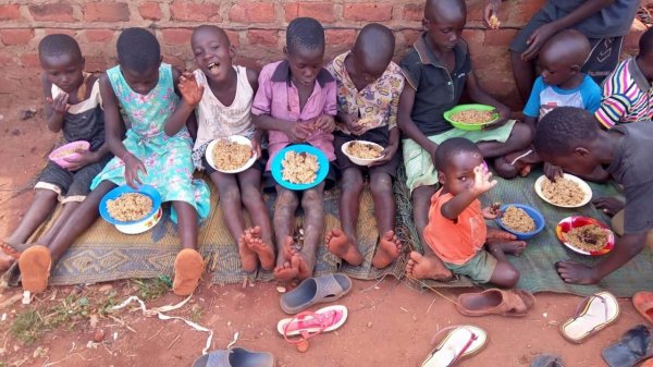 Mrs. Kawudha a widow and fine member of our staff has served a meal