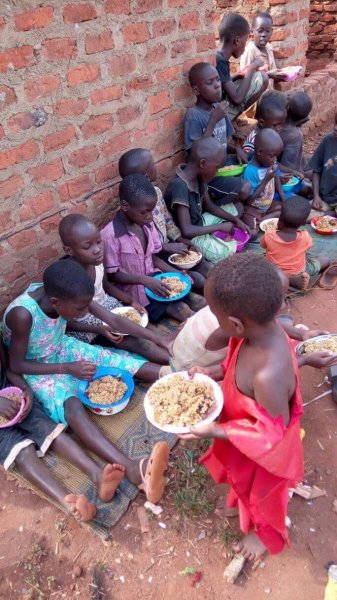 Mrs. Kawudha a widow and fine member of our staff has served a meal
