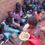 Mrs. Kawudha a widow and fine member of our staff has served a meal