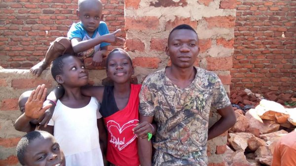 Our children greeting the good Samaritans of the world. 