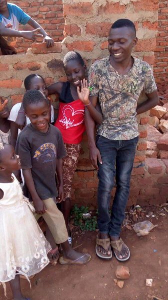 Our children greeting the good Samaritans of the world. 