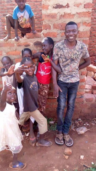 Our children greeting the good Samaritans of the world. 