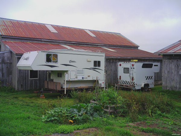 Camper for visitors and a portable office trailer for Construction